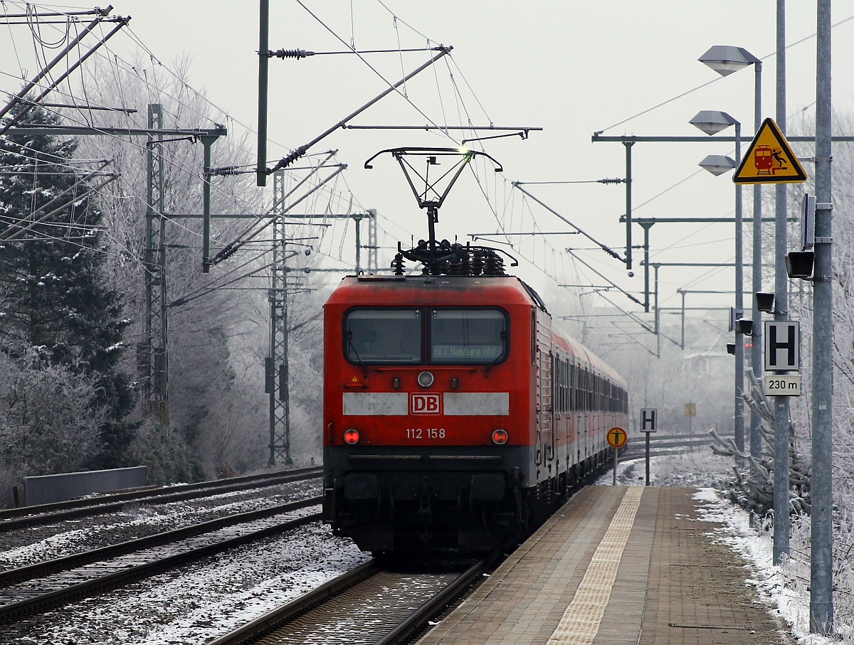 DB Regio Kiel 112 158(-1)als Schublok eines RE7 nach Hamburg. Schleswig 23.01.2015