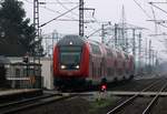 Mit ordentlichem Tempo rauscht hier der RE7 von Hamburg nach Flensburg mit der Schublok 6112 149-0 durch J�bek Richtung Flensburg.