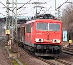 155 194-4 mit Misch-Gz aus Kiel Meimersdorf rauscht hier durch HH-Harburg.